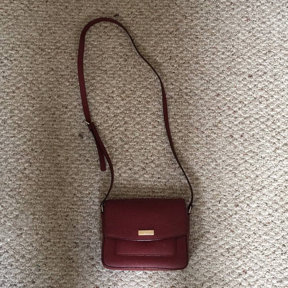 Kate Spade wine colored cross body bag